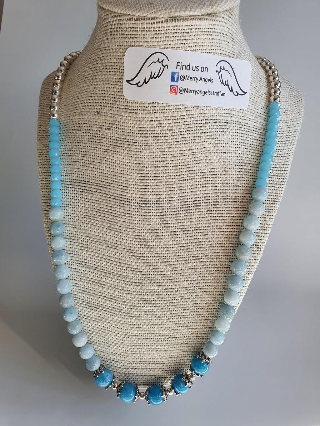 Turquoise, baby blue, and silver bead necklace. 