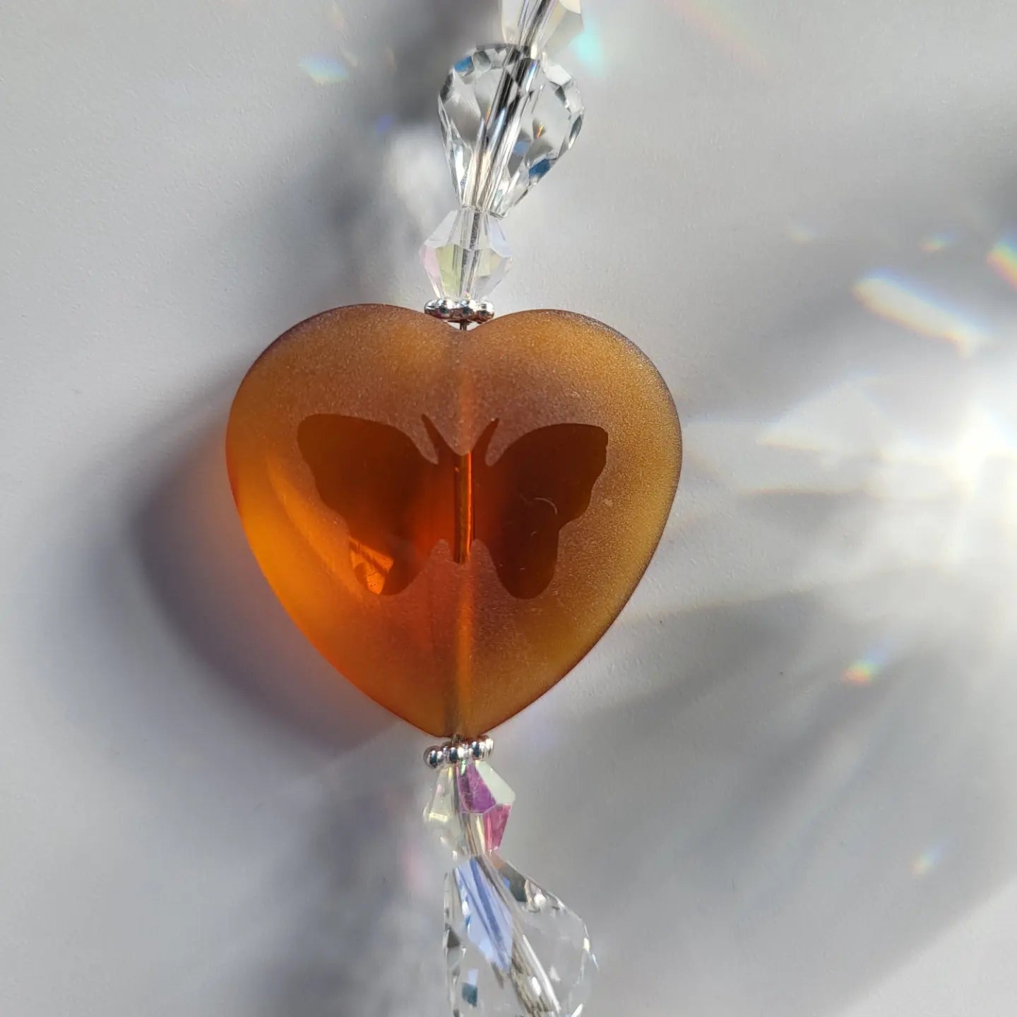 Amber Butterfly heart shaped bead with large drop crystal