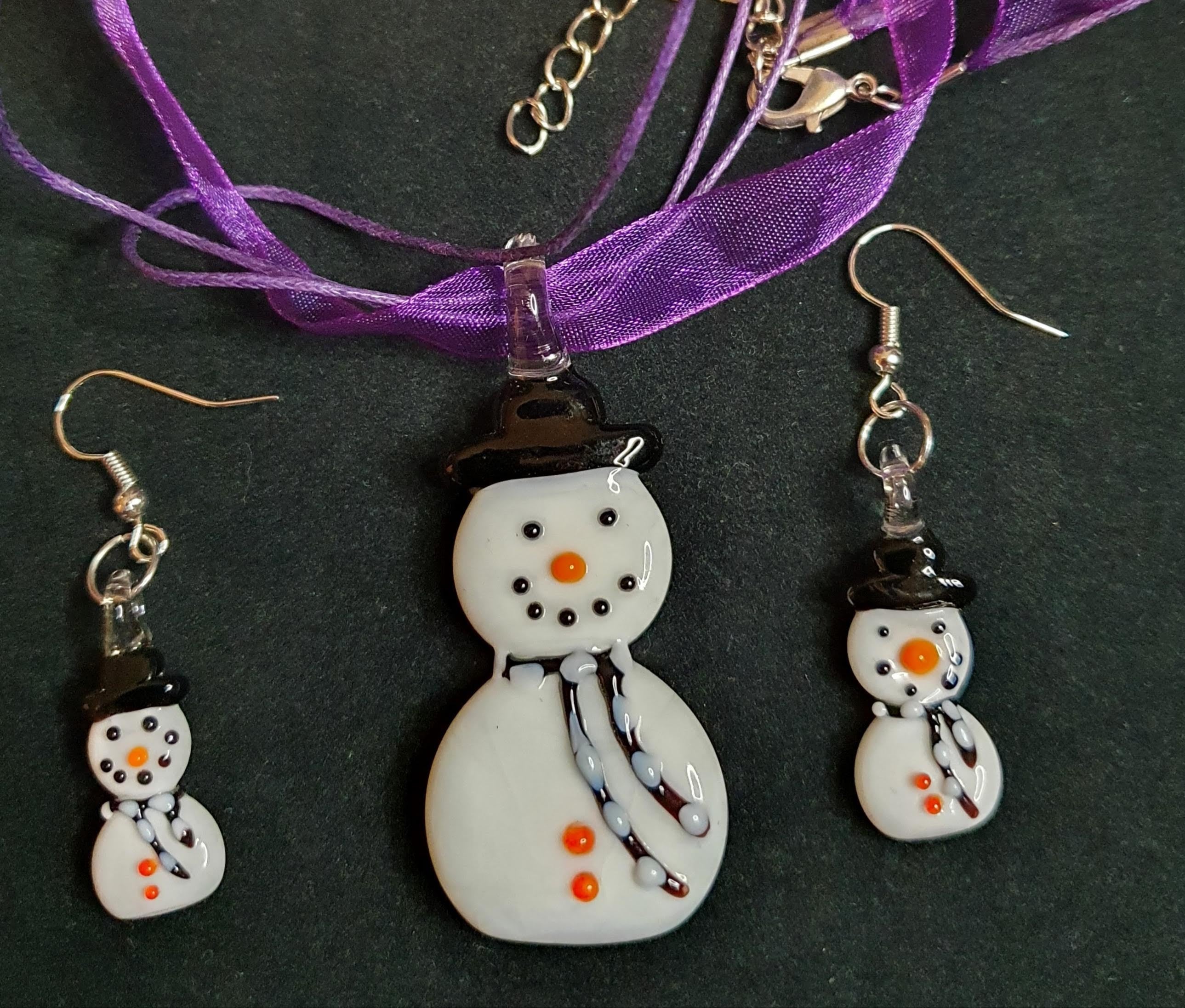 This is a picture of a snowman jewellery set