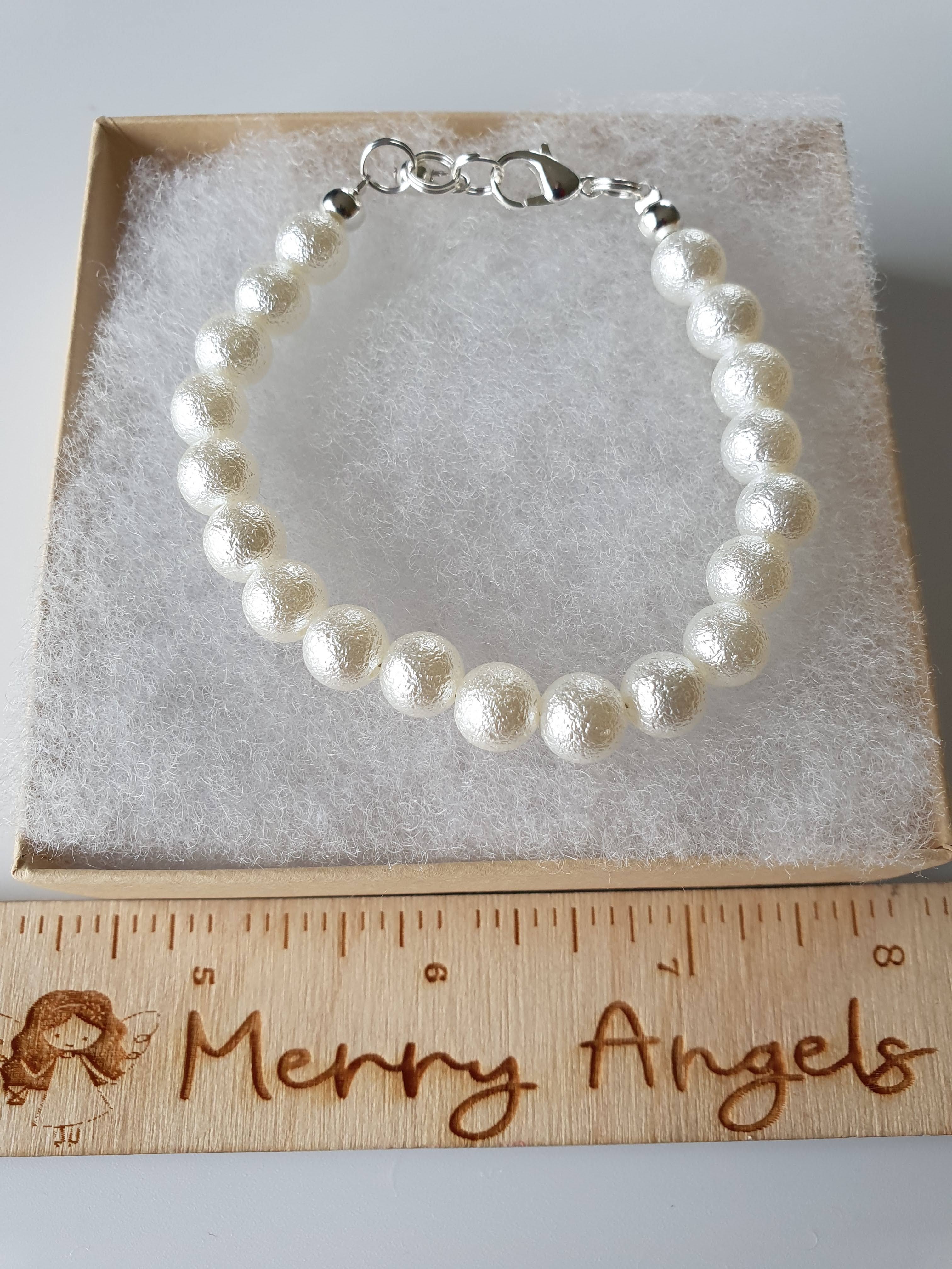 White bead bracelet. 