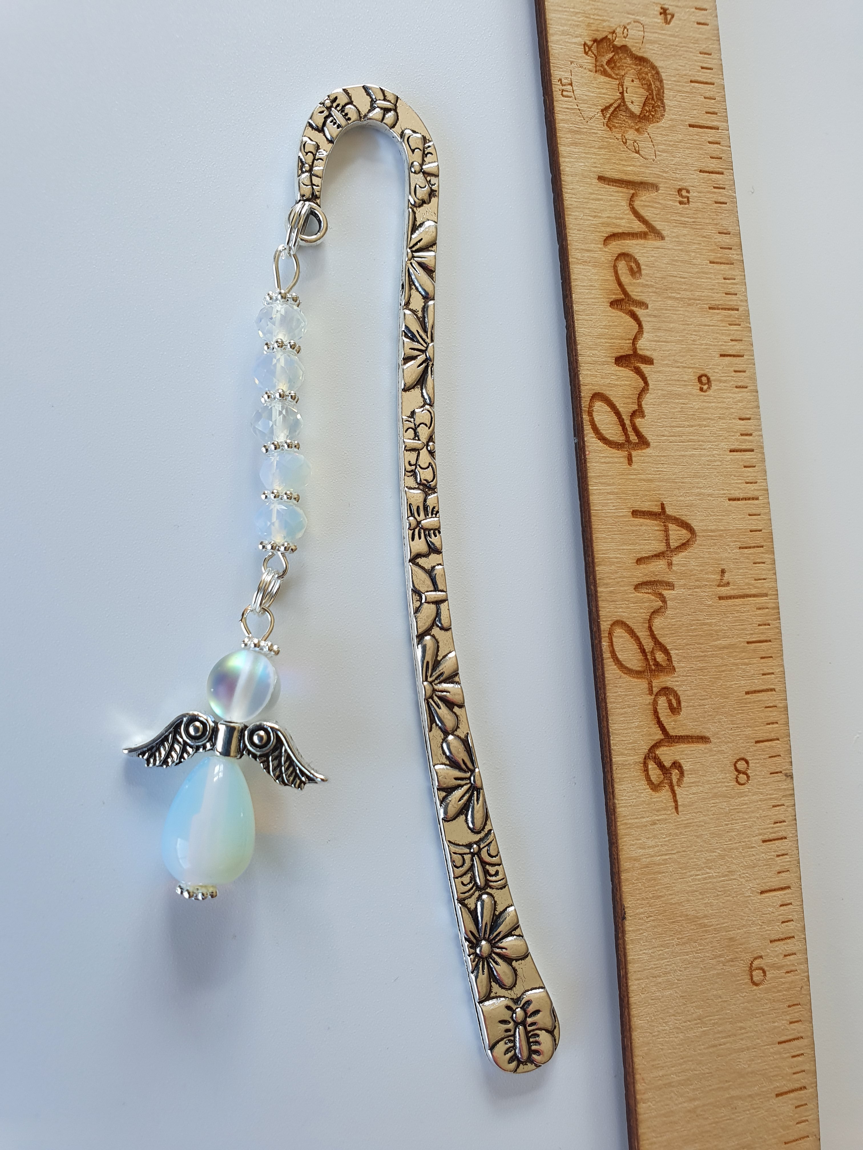 Beautiful silver bookmark with a clear angel