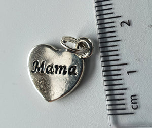 Silver charm with 'Mama' engraved on it