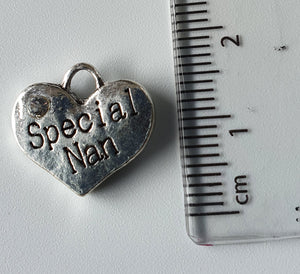 Silver charm with 'Special Nan' engraved on it