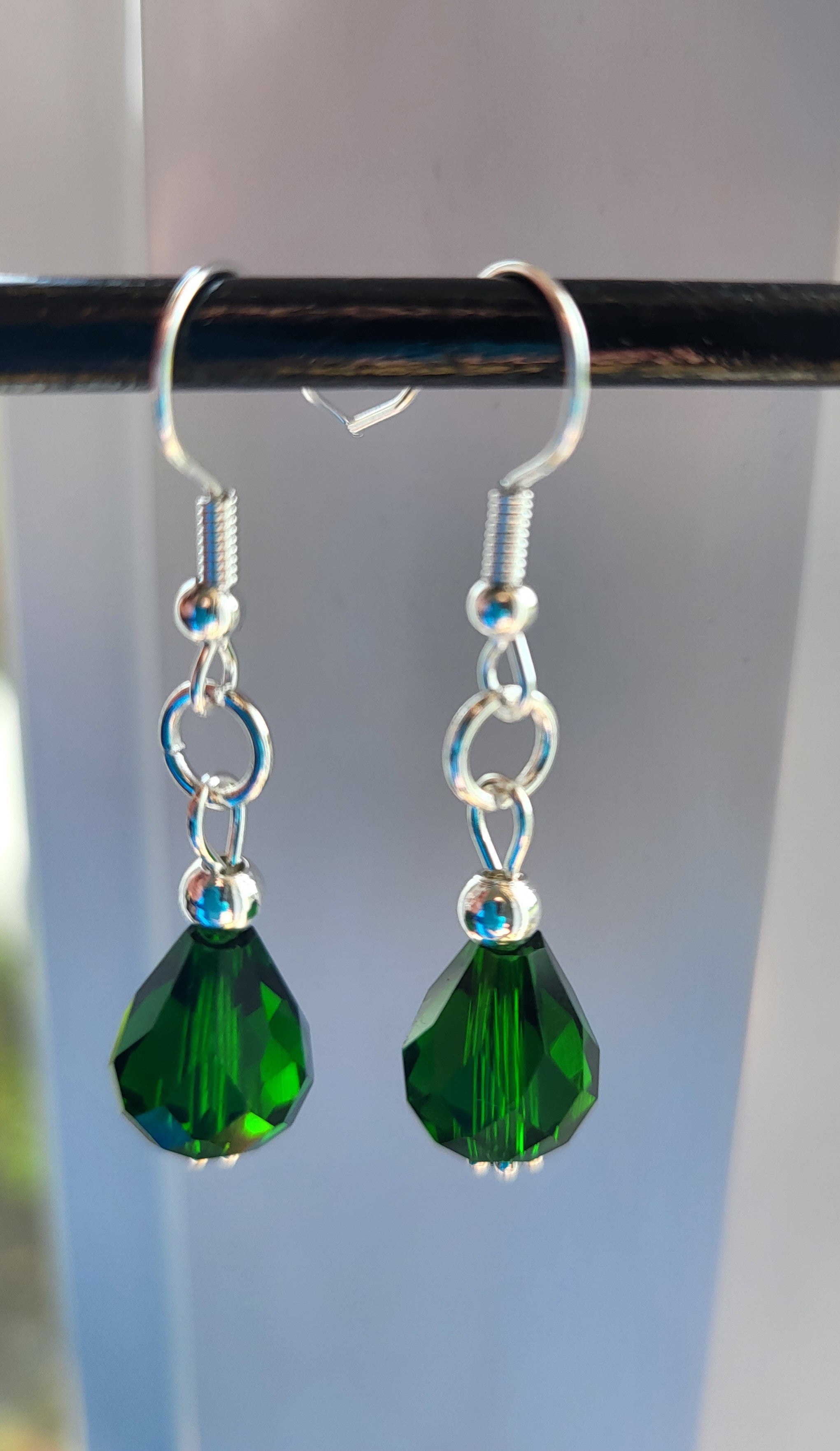 Emerald green dangle earring