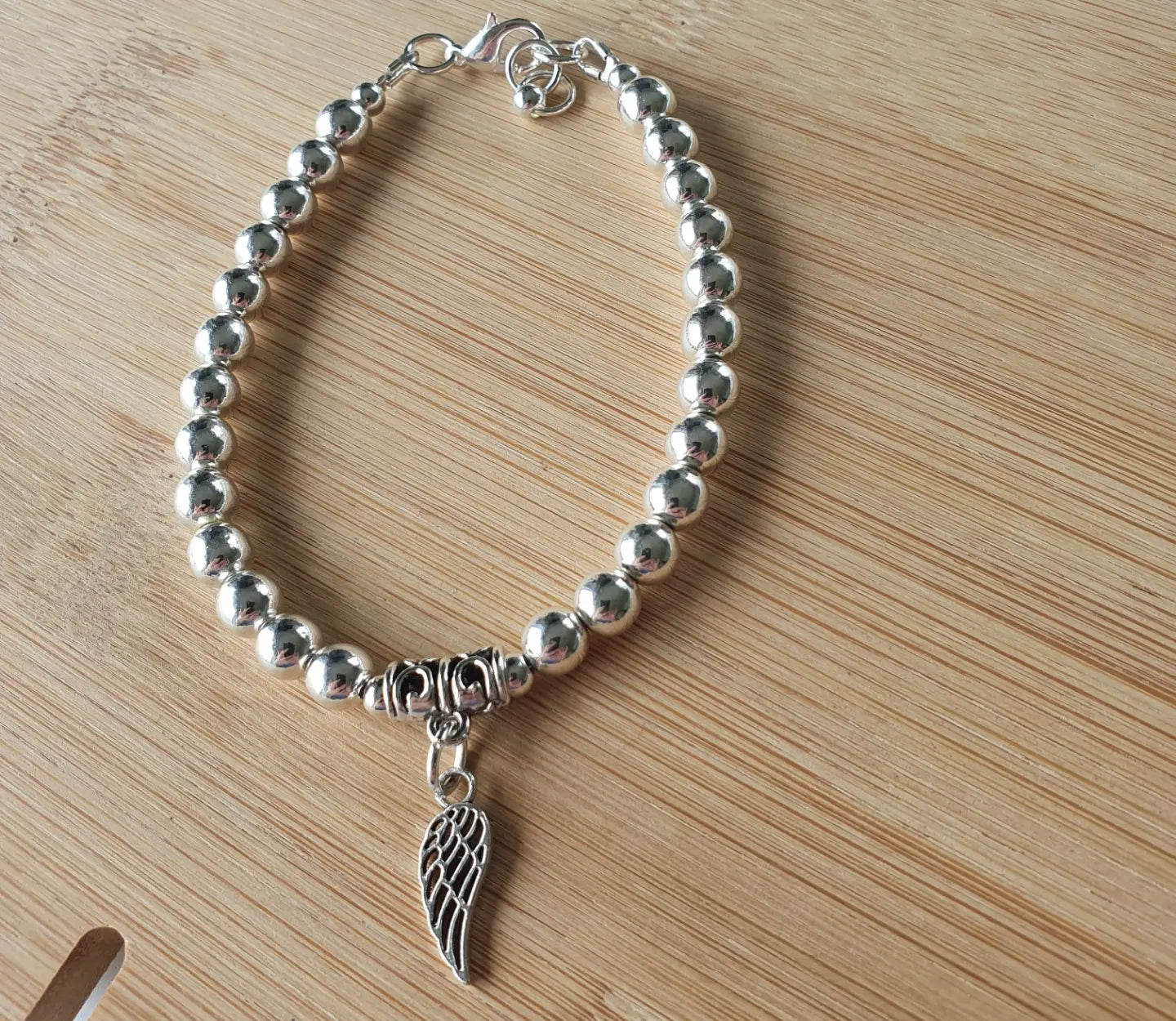 Silver coloured Wing bracelet