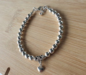 Silver coloured heart bracelet